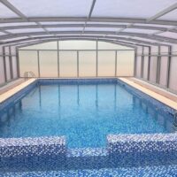Swimming pool retractable roof Swimming pool retractable roof