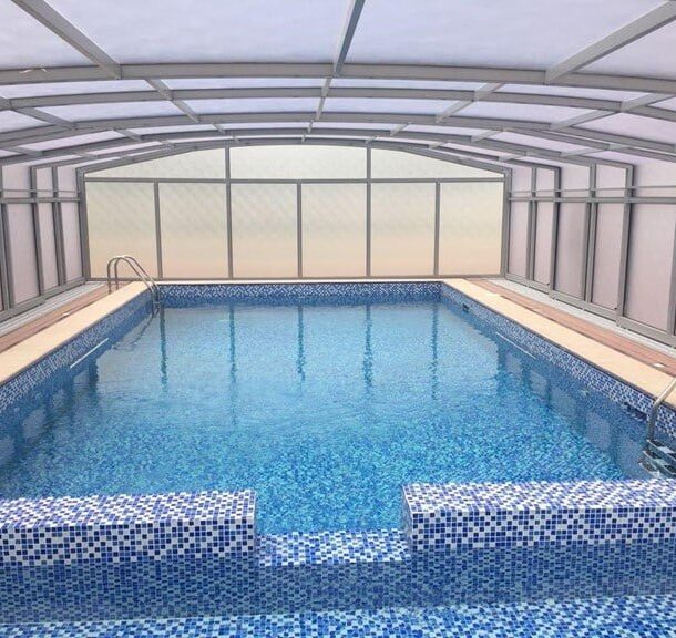 Swimming pool retractable roof Swimming pool retractable roof